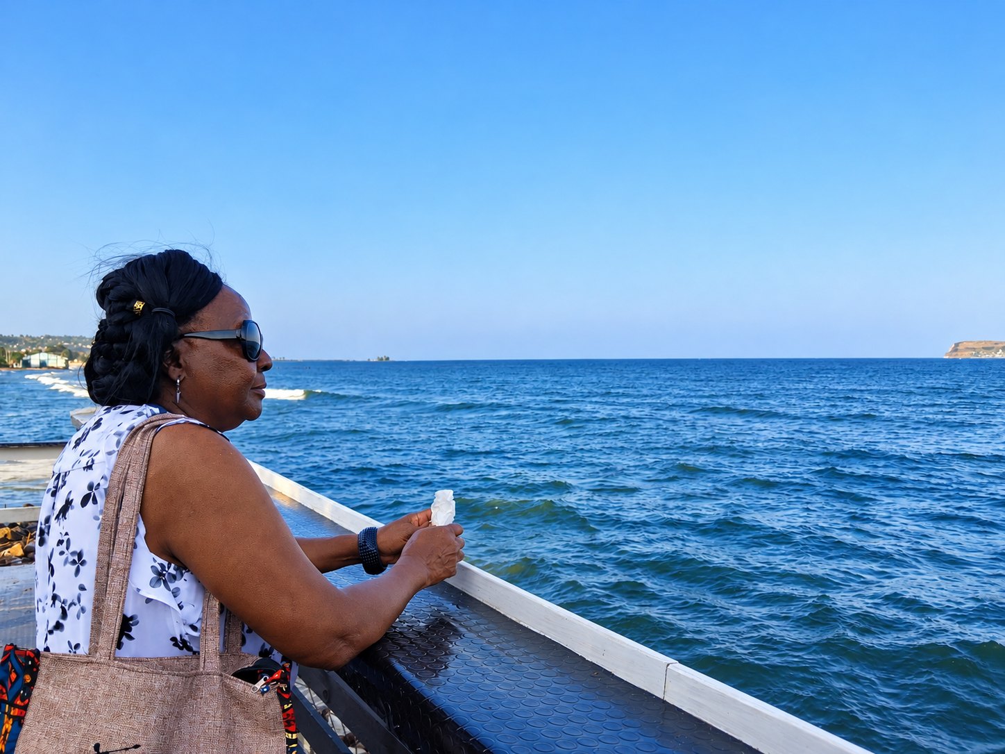 Guest enjoying an ocean view by the blue horizon