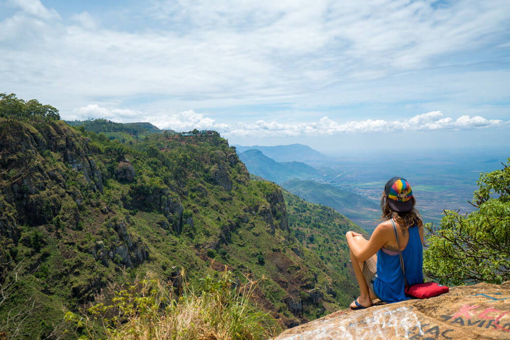 Traveller overlooking the mountain valleys of Lushoto